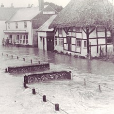 White Cottage and Parson's shop in flood White Cottage and Parson's shop in flood