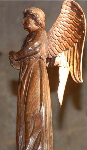 Carved angel which adorns the lectern, one of Ninian Comper's addition to the church.