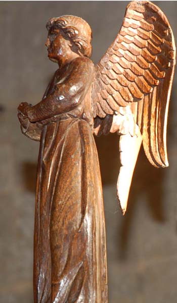 Carved angel which adorns the lectern, one of Ninian Comper's addition to the church.