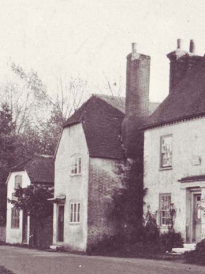 Old Bell Cottage, on the left, housed Edward A. Banhams, Saddler. It is said that villagers, who only possessed one pair of shoes, would bring these for mending. While waiting, they drank beer at an ale house at the same address 