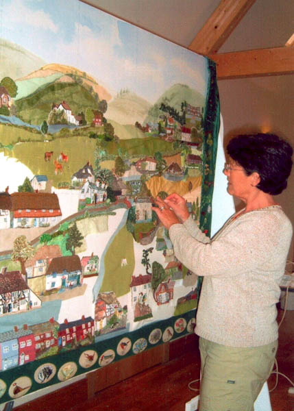 Cathy Clayson putting in the final touches