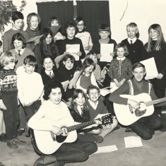 Little Folk group, 1969. Back row – left to right:Valerie Mason, Sharon Sykes, Bridget Lambert, Selina Kelly. Second row from the back – left to right: Ian Berry, Joanna Nott, Prue Nott, Teresa Berry, Steven Hoare, Gary Sykes, Linda Jaquillard. Next row: Duncan Traill, Andrew Nott, Katie Burley, Brigitte Jaquillard, Kim Sparrow, Julie Goddard, Fiona Trail Front row: Dixie Nott, Gillian Berry, Robert Matthews, Nigel Lambert.