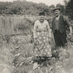 Couple in working clothes Couple in working clothes in garden