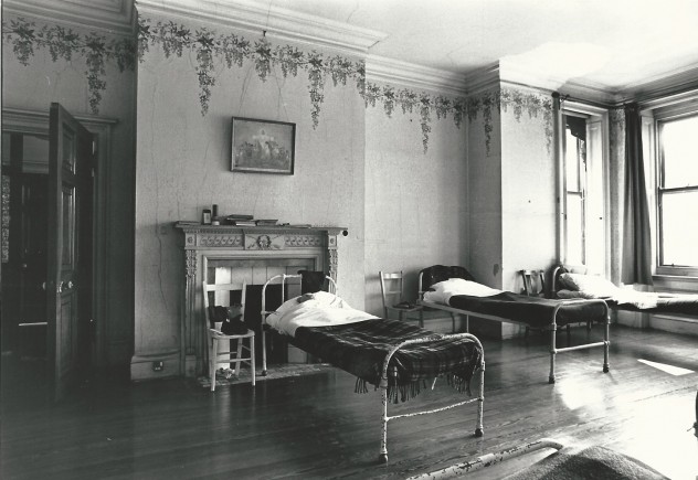 Dormitory at Wesbury House, with original wallpaper from re-building after the fire in 1904.