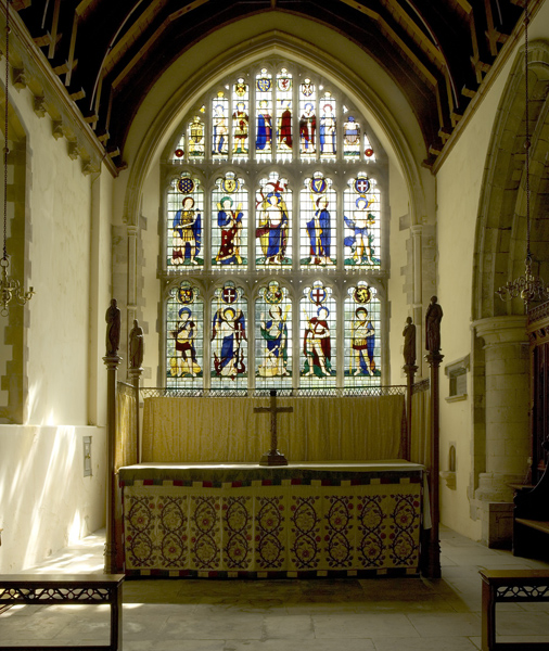 The East Window, designed by Comper as a memorial of World War II. (See details in 'East Window' page.)