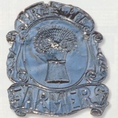 Fire Mark on Forge Sound: ‘Farmers Fire and Life Insurance Company’. In the 18th and 19th centuries, houses with insurance against fire mounted these fire marks on their outside wall, to indicate to the fire fighters employed by the insurance company that they should attempt to put the fire out.
