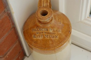 The label on this pot reads: Francis Dear, Spirit Merchant, East Meon. Francis Dear was publican at The New Inn in 1875. The pot belongs to Frank Wheeler.