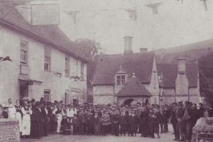 Staff and villagers outside the George Inn, celebrating Queen Victoria's Golden Jubliee, June 1887