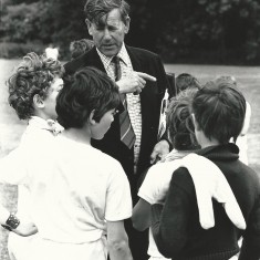 Second Headmaster Sherrard Manning with boys on sports day.