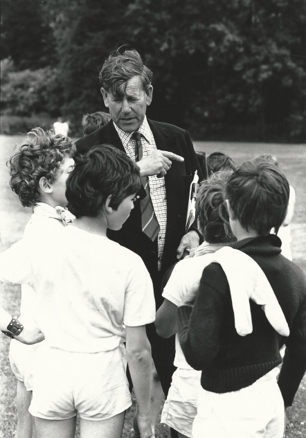 Second Headmaster Sherrard Manning with boys on sports day.