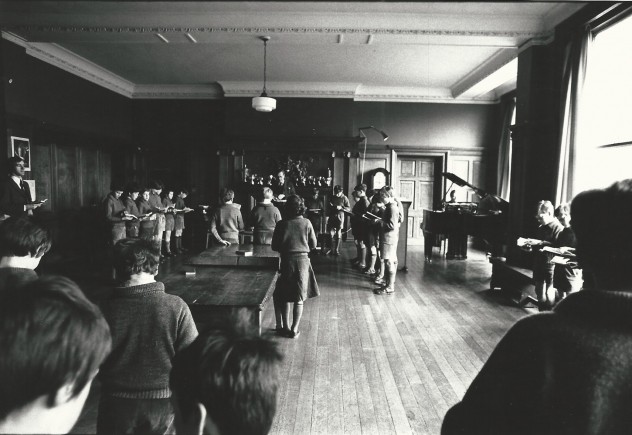 The school at morning prayers in the organ room.