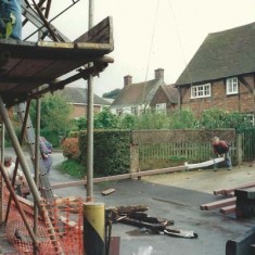 Scaffolding on the street side, and Heycroft House opposite.