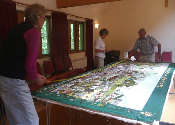 Stretching the canvas on to the oak frame_1 Stretching the canvas on to the oak frame.