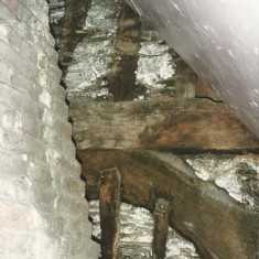 Truss beam, wattle and daub, laid bare (edge of Victorian chimney breast in front)