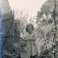 Olivia with chickens and outhouse Olivia with chickens – the pig was kept nearby