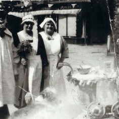 Group (helpers?) in fancy dress.