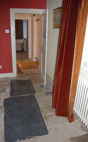It is possible that Dom Sigebert's remains are buried under these flagstones.