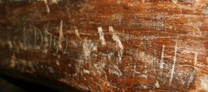 Chimney breast markings “Trinity marks” on chimney breast in the hall – three triangulated parallel vertical lines burned into the massive oak beam; The invocation of the Trinity was believed to protect the house from evil spirits.