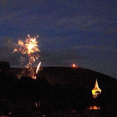 Fireworks, beacon and church tower
