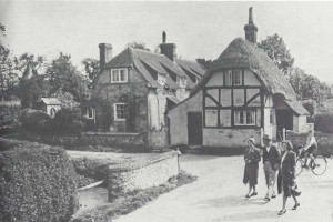 Frogmore in the 1930s. Mill Cottage, thatched, how has a tiled roof. The other cottage has been demolished.