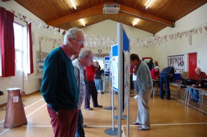 House History panels, History Group member Tony Norman viewing.