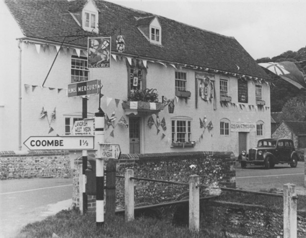 George with bunting for Coronation of Queen Elizabeth II, June 1953