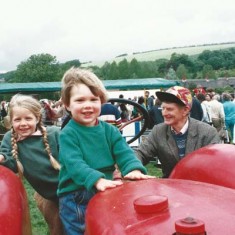 Ginger Phillips and kids on tractor