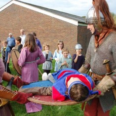 Harold carried off on shield
