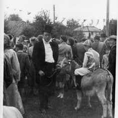 J. Pollard in top hat and tails.