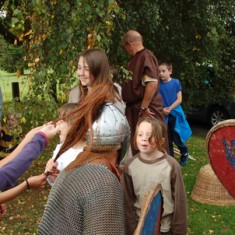 King Harold is briefed by the Saxon re-enactor.