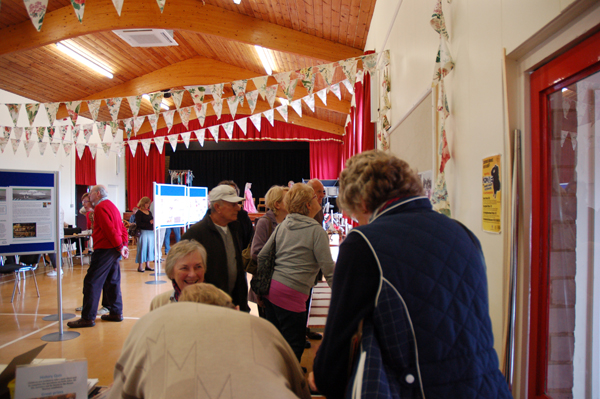General view with visitors signing in.