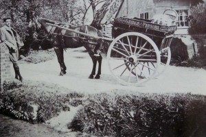 Savage and Parsons cart in Frogmore, Charlie Merritt leaning casually against the bridge.