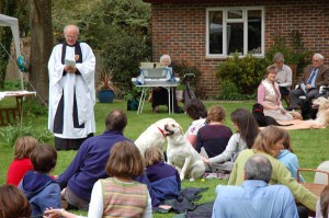Outdoor pets' service in garden of Vicarage.