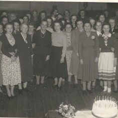 WI occasion at the Institute Large gathering at the old Village Institute. Marion Lambert, Bridget's mother, is in the crowd .