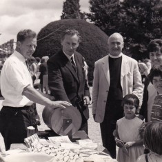 William Douglas Home draws tombola tickets