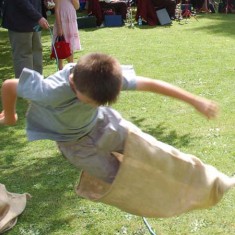 Finishing the sack race
