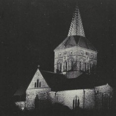 Post card of All Saints at night.