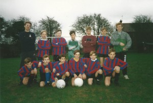 East Meon juniors football team, managed by Jeff  Wheeler.(back row, left) and Martin Cooke (right). Team, left to right, back row, WIlliam Normandale, Adrian Powney, Wayne Harfield, Jason Thorne, Joe North. Front row, Adam Dowlen, Stewart Powney. James Gough,Andrew Blackman Wayne Carter, Sam North.