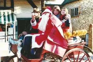 Fr Christmas, Arthur  Newbury  with glass, Malcolm Paynter driver, outside Post Office, with two girls.