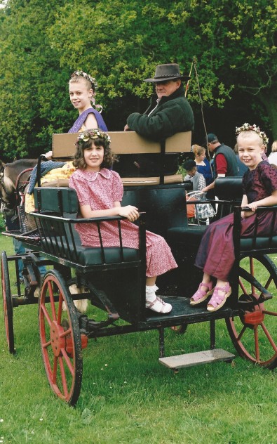 The May Queen's procession. The driver is Malcolm Paynter.