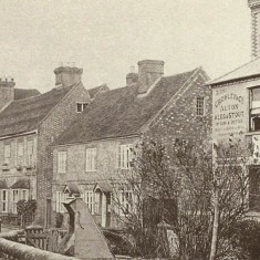 East Meon High Street, New Inn on right (note Alton Brewery owns it). Well-head on what is now Washers Triangle at front