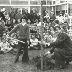 Jonathan Sparrow with spade, Wyndham Lewis, headmaster holding tree.