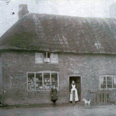 Mrs Potter outside Potter's General Warehouse, 1911. She took over the business when her husband died.