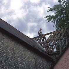 Denys sawing away at rafters Denys sawing away at rafters.
