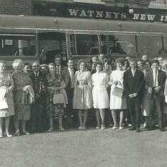 Group by bus outside New Inn