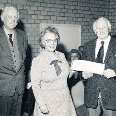 Herbie Goddard receives certificate Herbie Goddard receives certificate from his successor, Betty Tucker, March 1981.