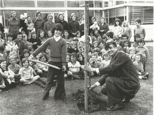 Jonathan Sparrow, Wynn Lewis, headmaster Jonathan Sparrow and Wynn Lewis, headmaster, planting tree in school grounds.