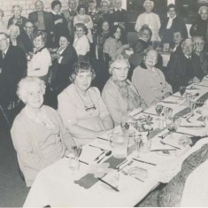 Luncheon Club in VIllage Institute, date unknown.  Kit Tubb, Marion Blackman, Rods Mauback, …. Marjorie Lambert,Thelma Hoare Sylvia Whittear, Daisy & Fred Gibbs, Mrs Tee, Jean Blackman, Kath Adams, Nellie Goddard, Pam Goddard, another, Mrs Porch, Jessie Crockford, Mrs Ivy Blackman
