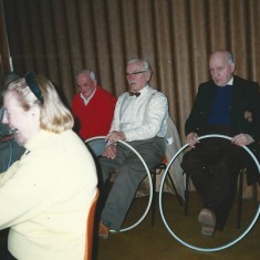 Old folk with hoops and piano accompaniment