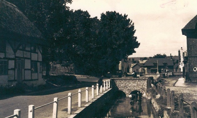 High Street looking west, dated 1909.